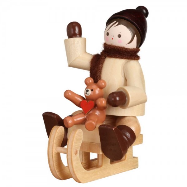 Miniature winter child with teddy on sled by Romy Thiel