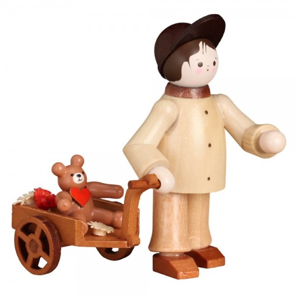 Miniature boy with teddy in wagon by Romy Thiel